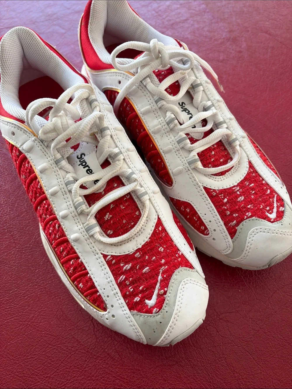 White and Red Nike x Supreme Sneakers